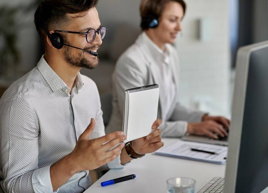 A diverse team of call center agents with headsets, ready to provide a wide range of call center services